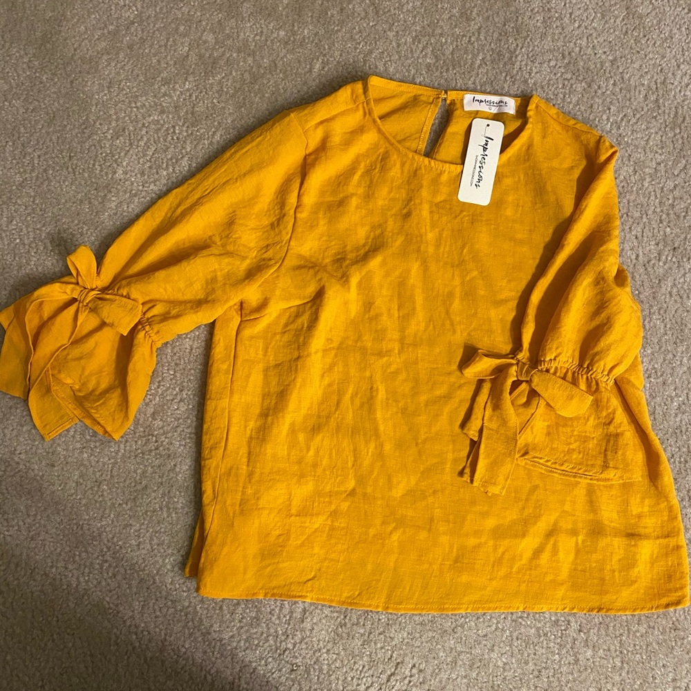 Boutique Blouse Bow Sleeve Detail